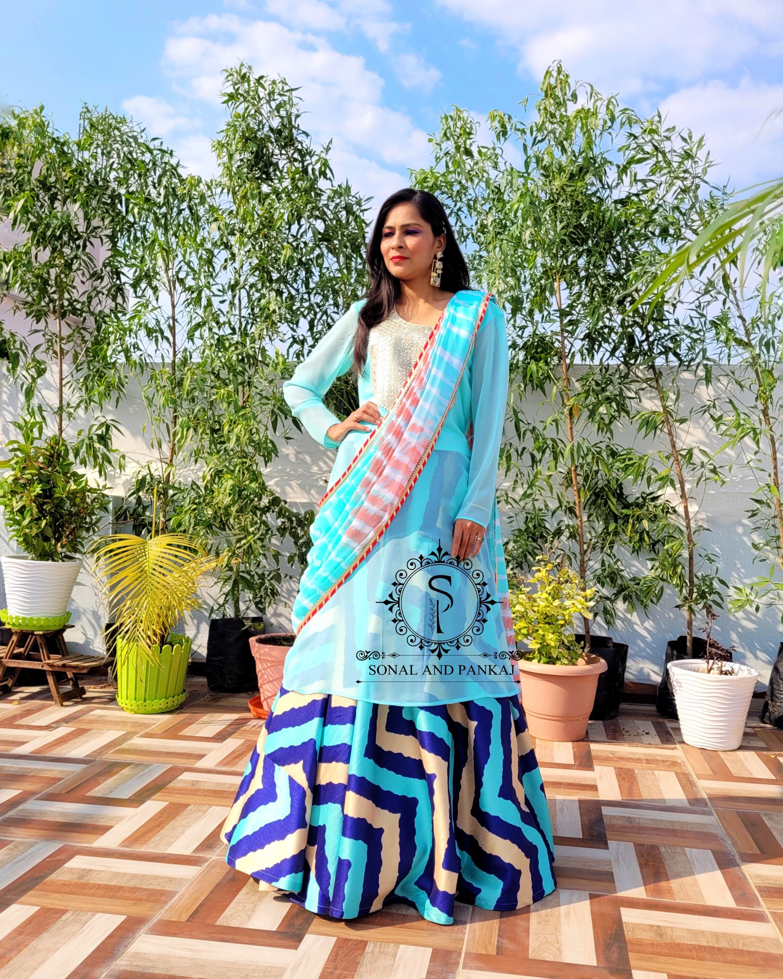 Women's Floral Blue and White Combination Printed A-Line Kurta With Tassels