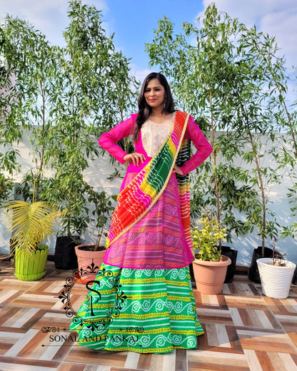 Rani Pink Drape Kurti With Green Bandhani Lehenga - IW01161