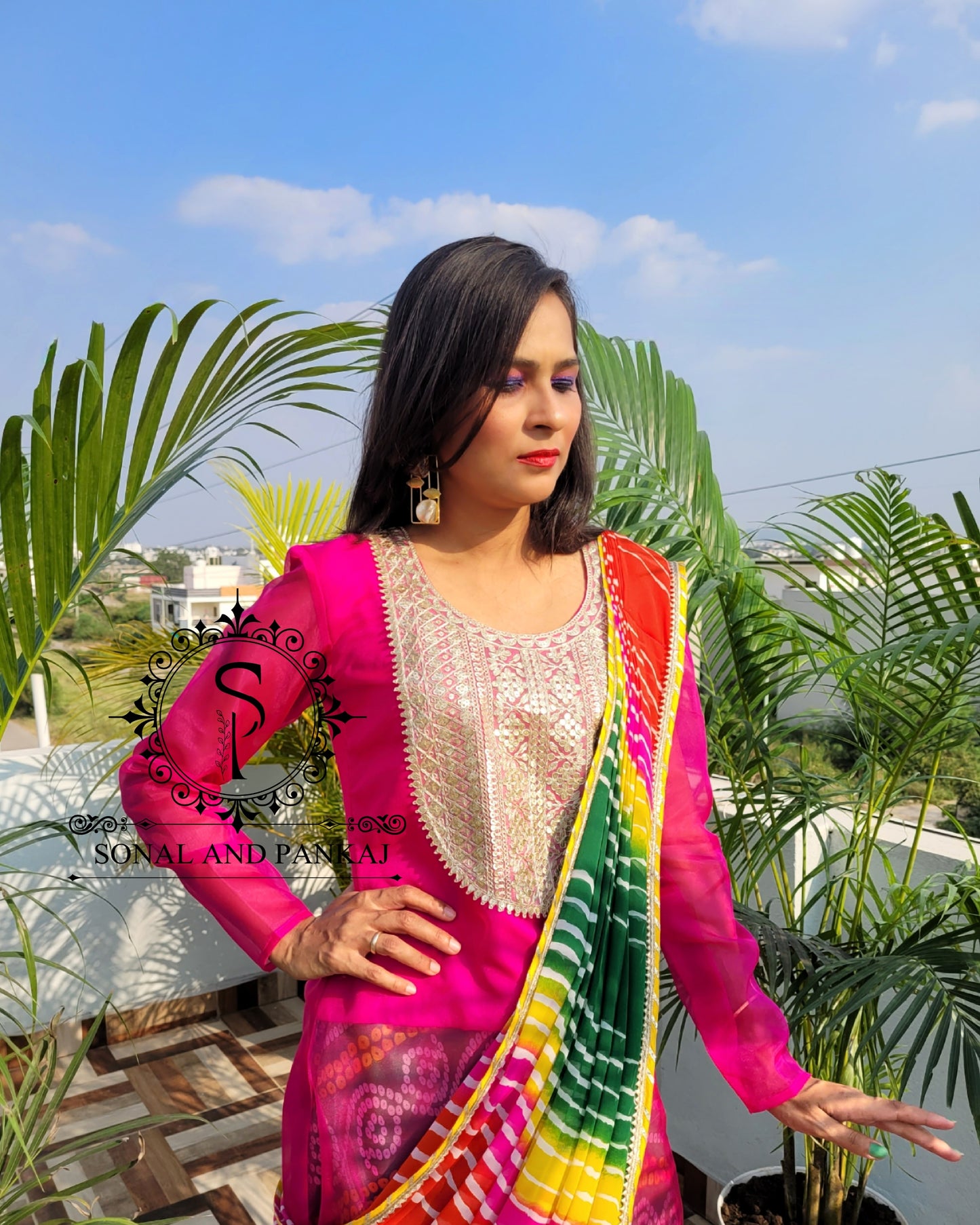 Rani Pink Drape Kurti With Green Bandhani Lehenga - IW01161