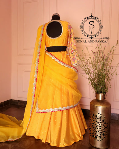 Haldi Yellow Peplum Angarakkha Style Blouse With Beautiful Duppatta & Lehenga - IW01198