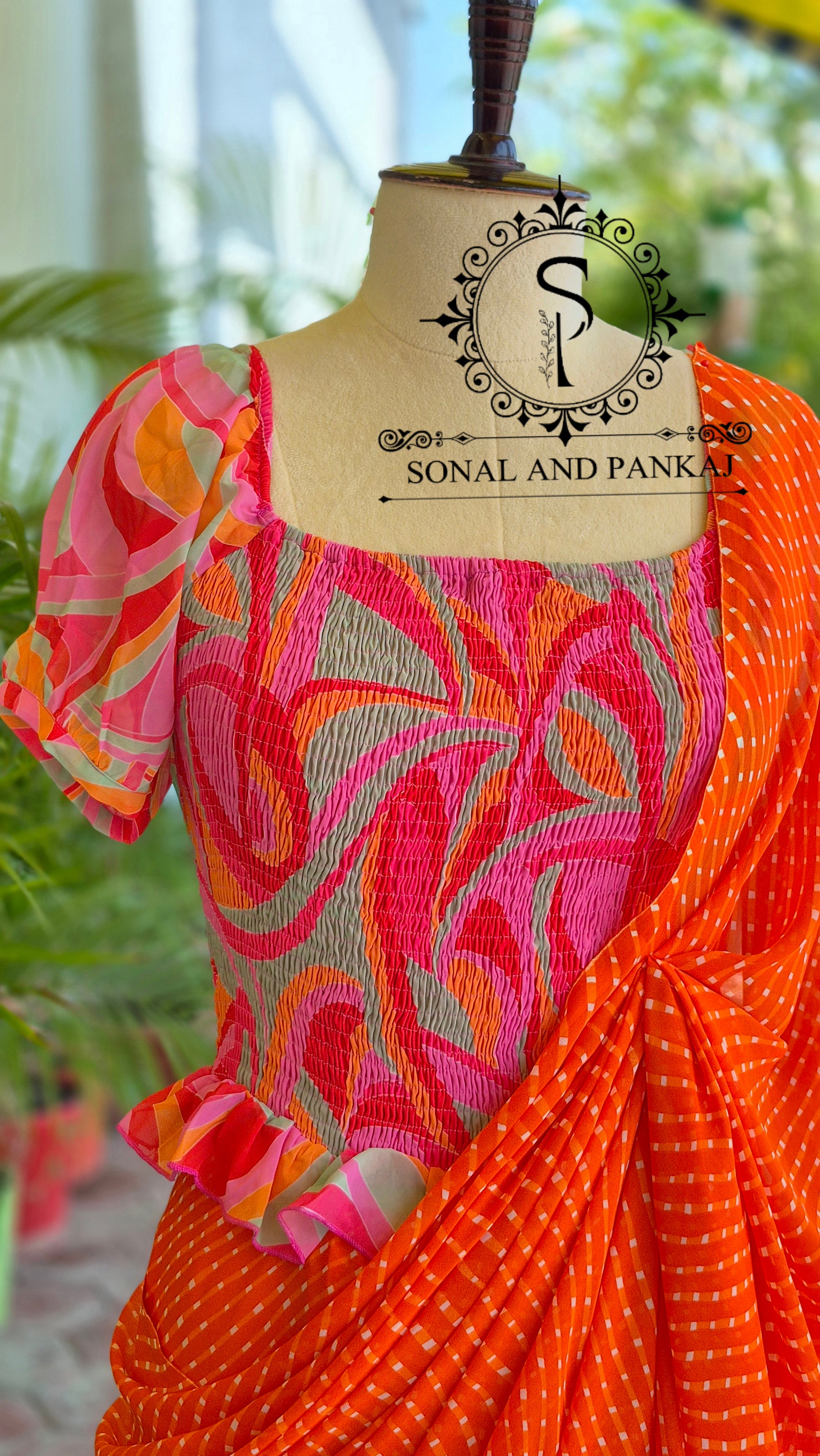 Abstract Print Smocking Top & Orange Moothra Saree On Sale - SA01697