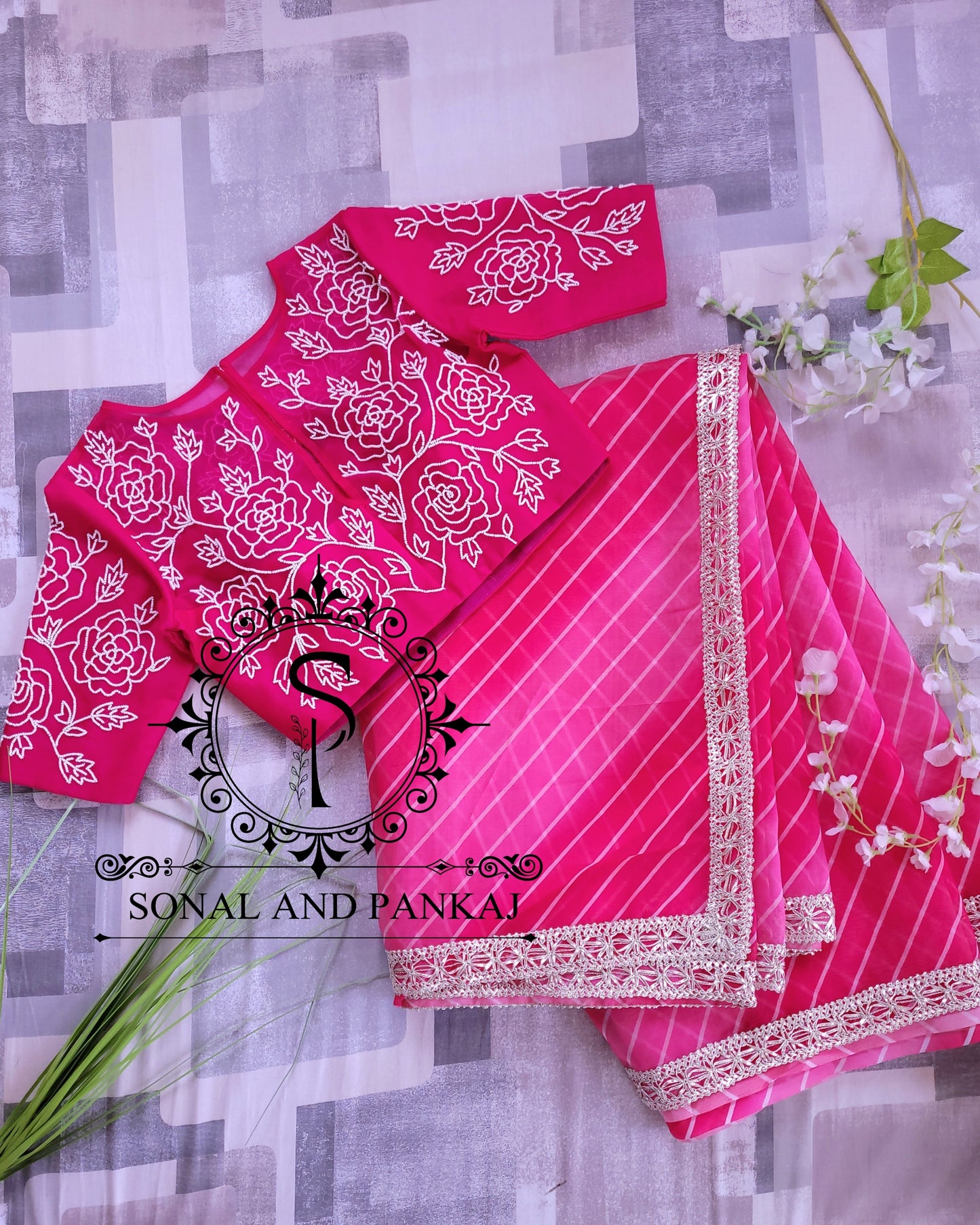 Organza Leheriya Print Saree With Rani Pink Hand Embroidered Blouse - SA01041